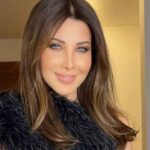 نانسي عجرم تردّ على منتقدي صورتها مع “صهيوني”(صورة) 1 نانسي عجرم تردّ على منتقدي صورتها مع “صهيوني”(صورة) – نانسي